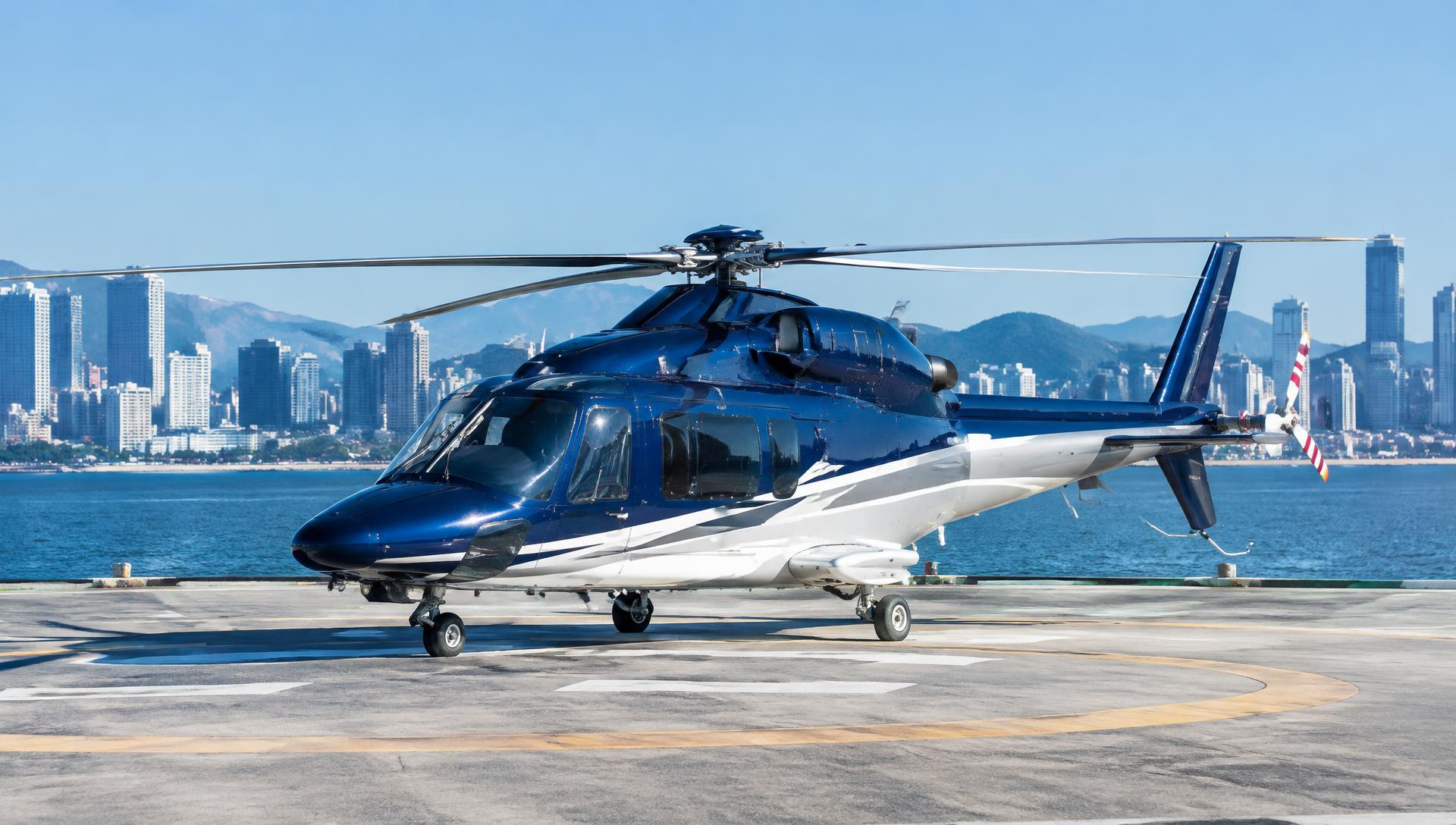 Executive helicopter on a coastal city landing pad